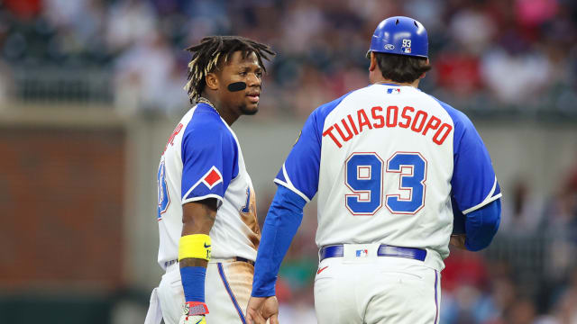 Jul 28, 2023; Atlanta, Georgia, USA; Atlanta Braves right fielder Ronald Acuna Jr. (13) reacts after being thrown out at second with third base coach Matt Tuiasosopo (93) against the Milwaukee Brewers in the first inning at Truist Park.